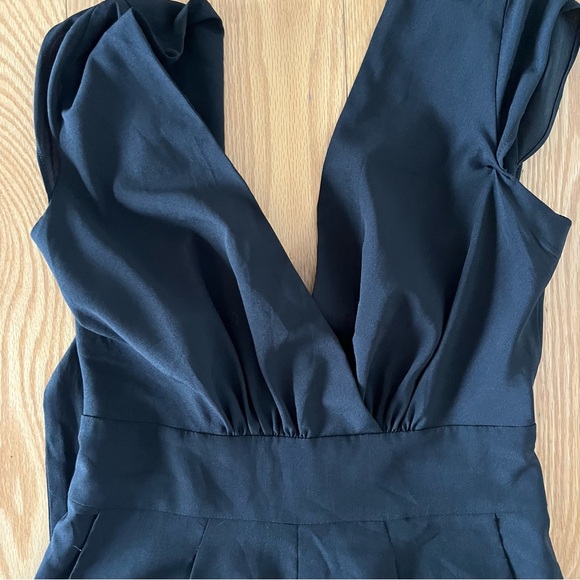 Bebe black jumpsuit with a tie back - Picture 6 of 7